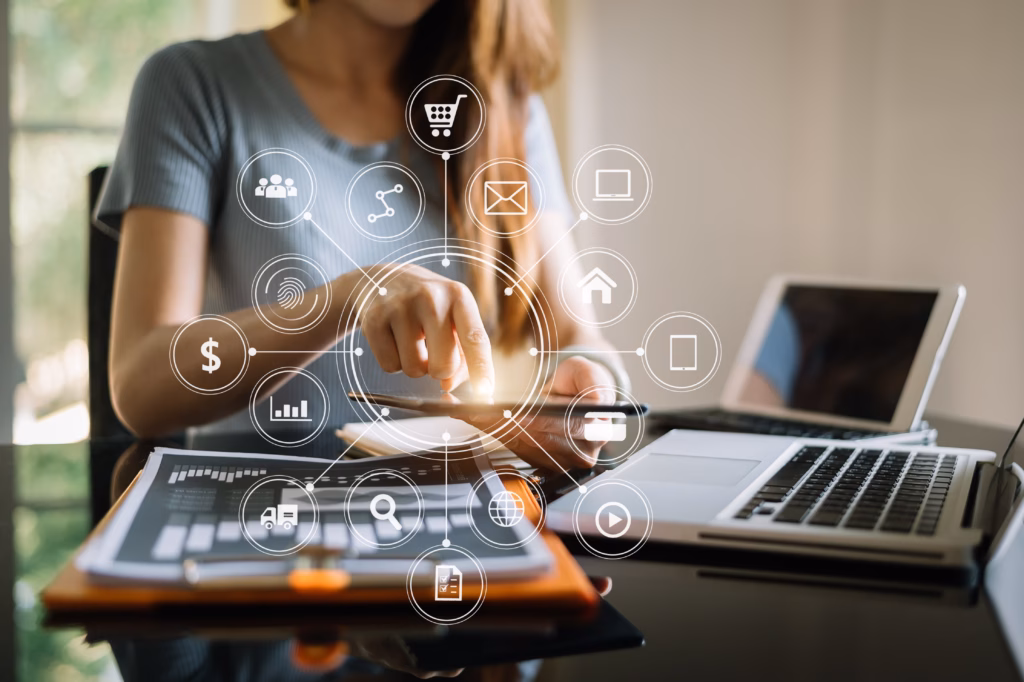 Businesswoman working with smart phone and laptop and digital tablet computer in office with digital marketing media in virtual icon